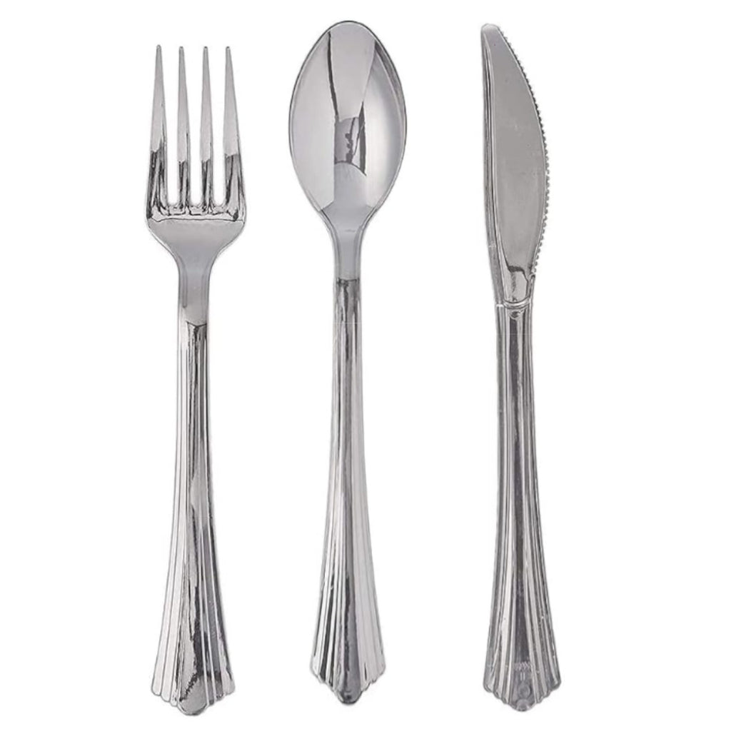 Bag of 24 assorted silver forks, knives, and spoons.