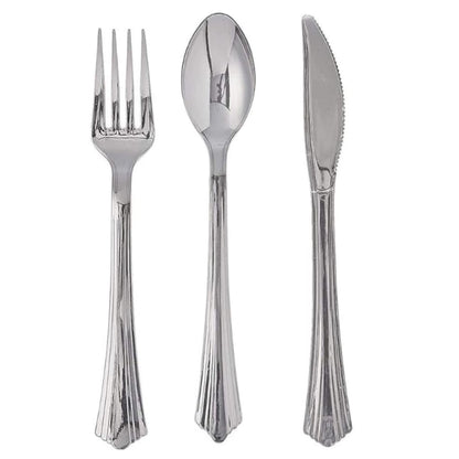 Bag of 24 assorted silver forks, knives, and spoons.